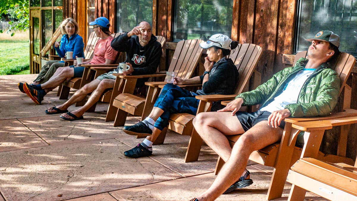 Runners resting on the porch at the Stehekin Valley Ranch